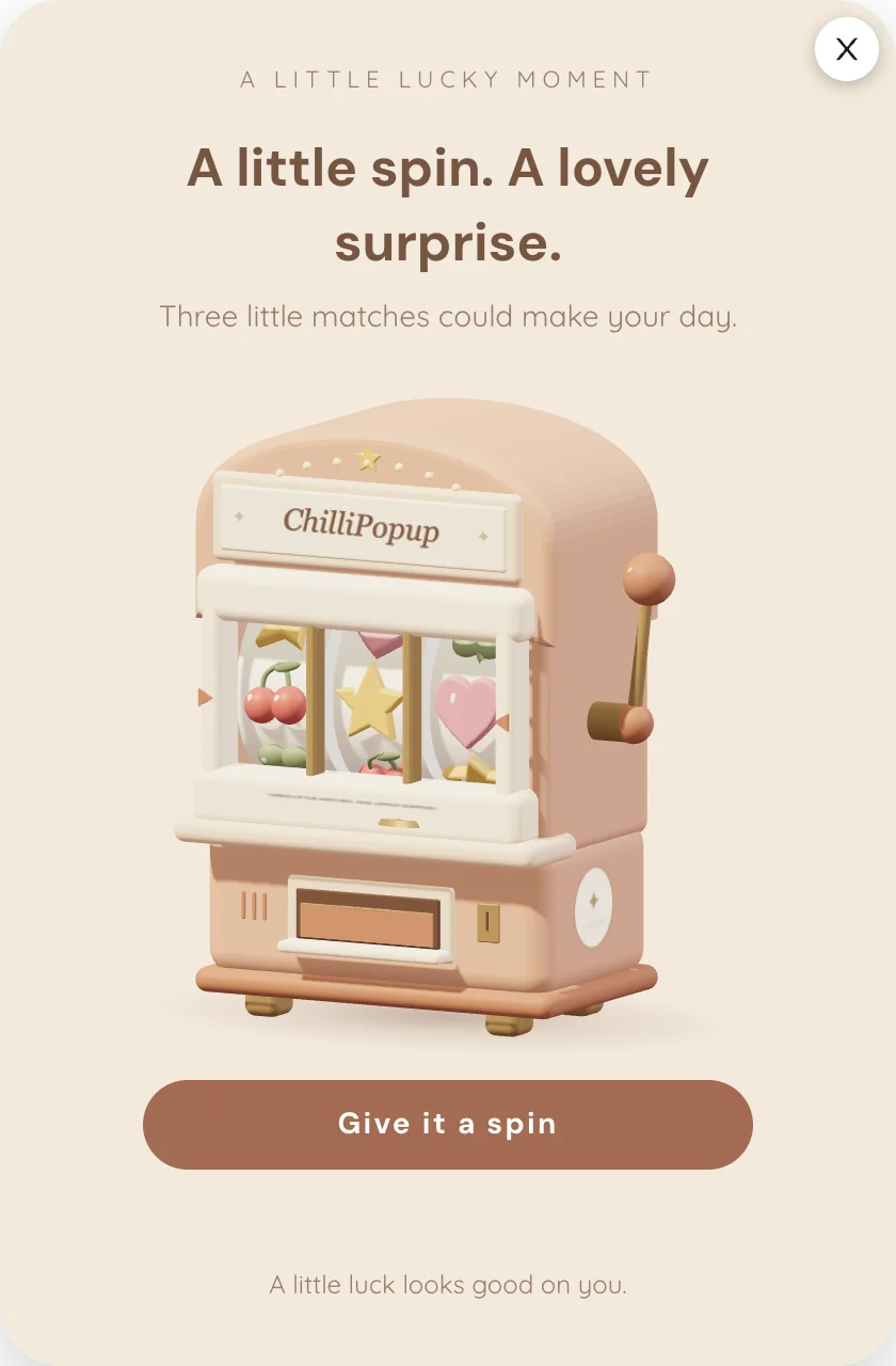 Little Lucky, the starter Slot Machine theme: a cozy 3D slot cabinet with sculpted symbols and a Spin button on a cream card